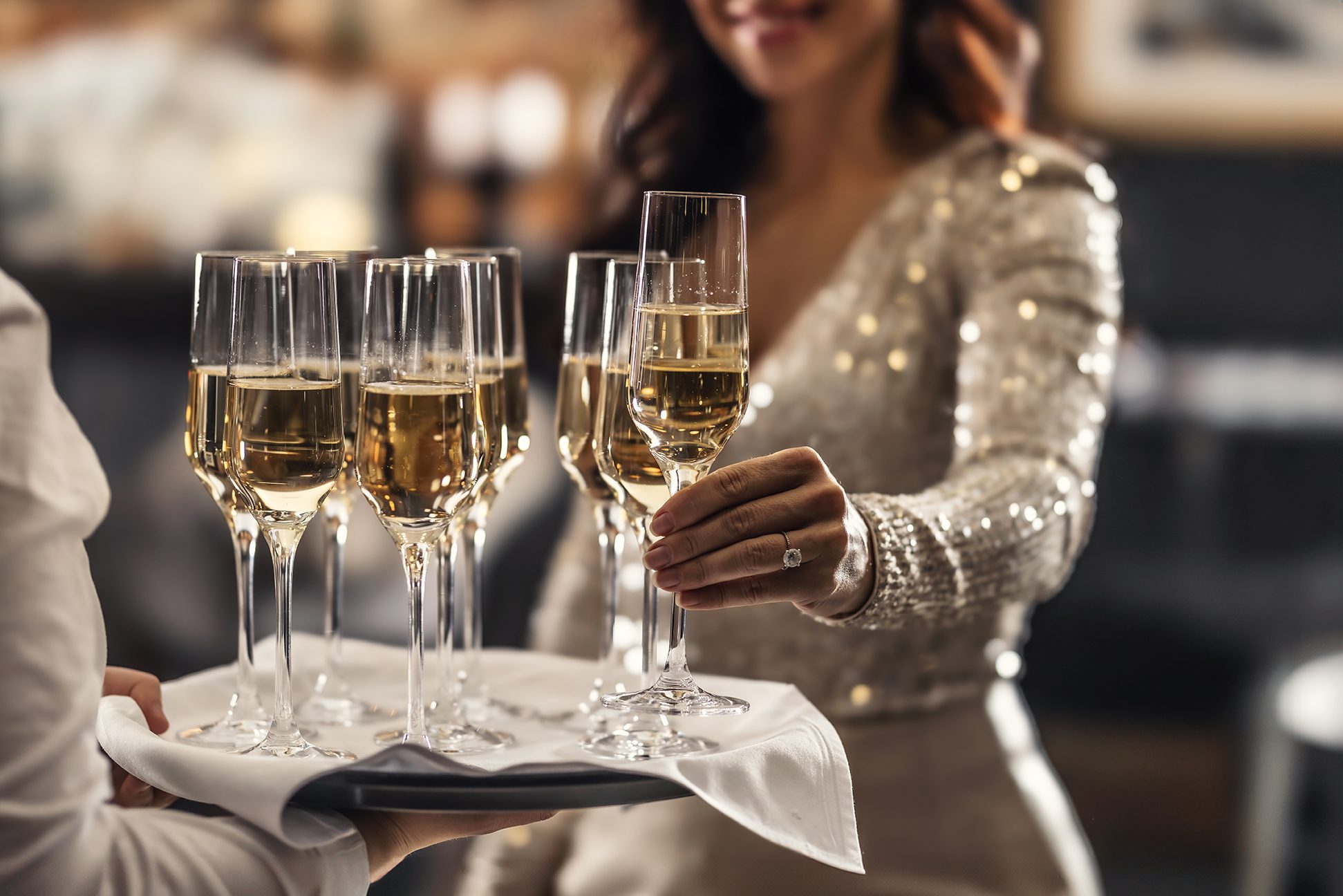 New Year's Eve 2027 celebrated with champagne